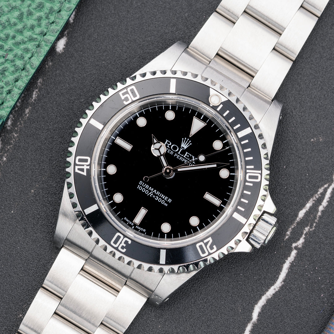 2004 Rolex Submariner Ref. 14060M with Box & Papers